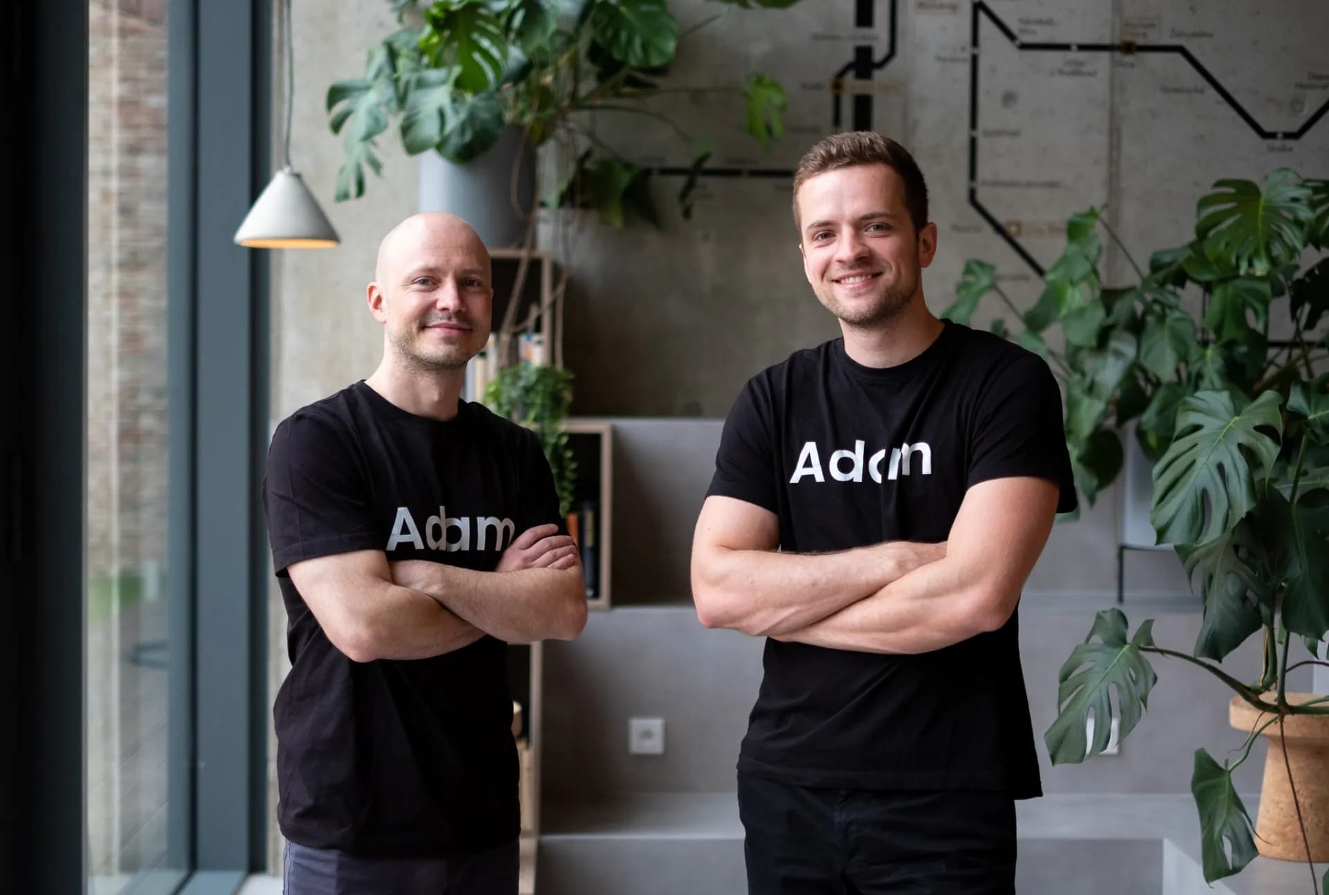 Adam team founders in their modern office