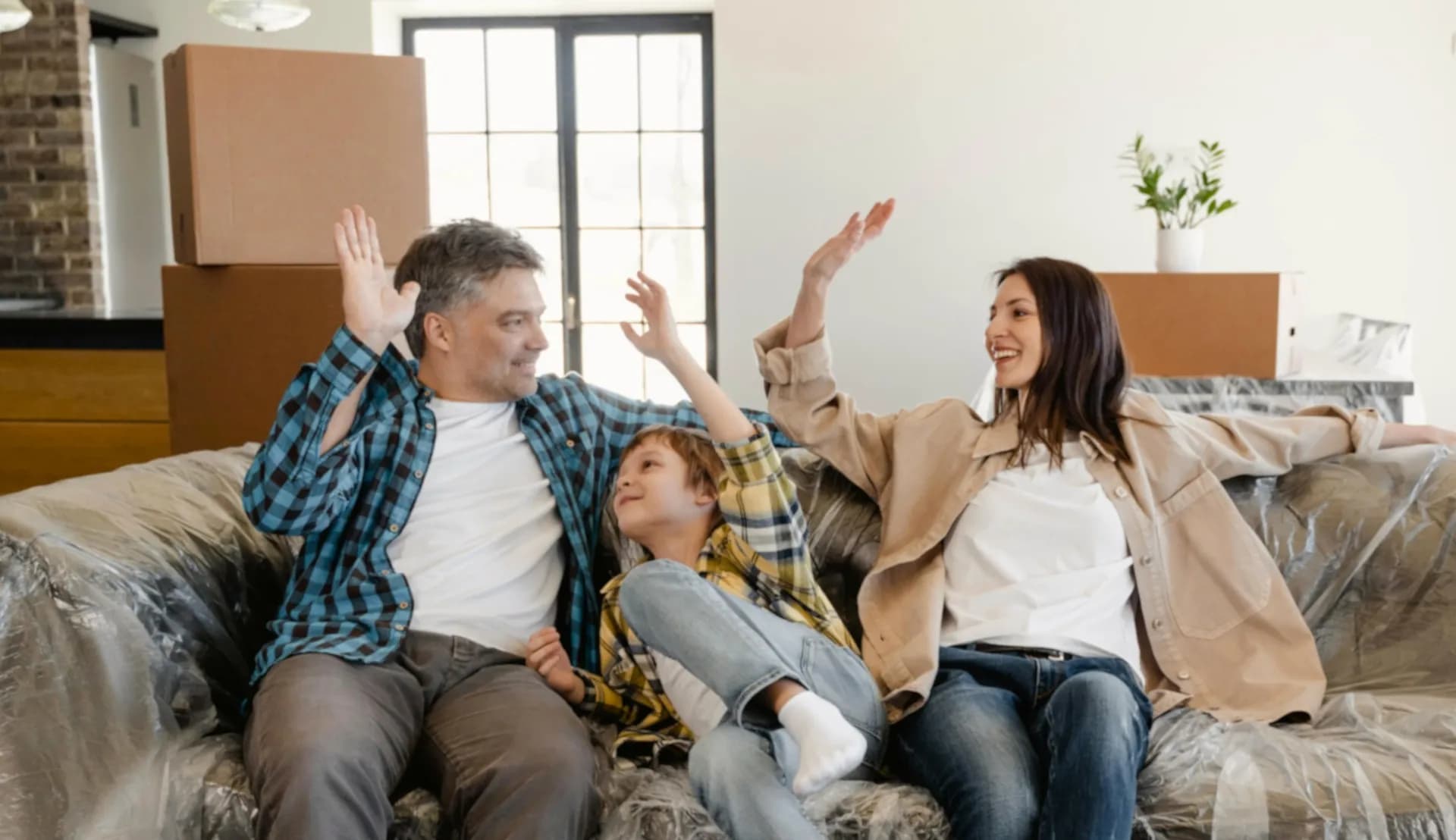 Happy family enjoying a safe and secure home environment with professional tradespeople safety standards